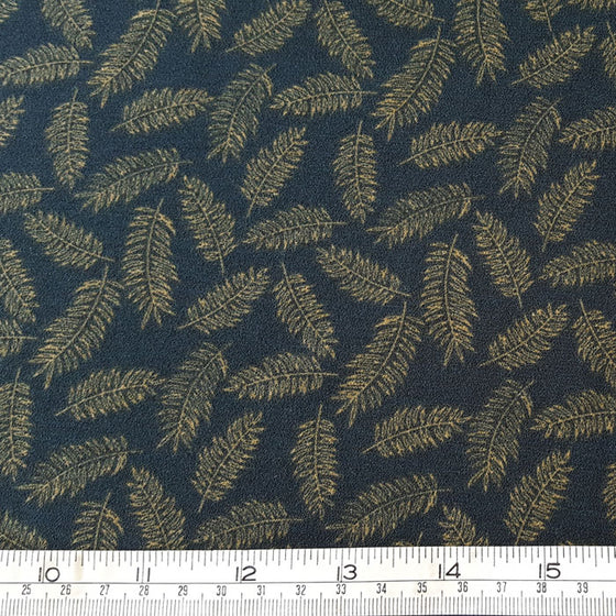 Polyester Crepe Fabric with stretch Beige Feathers on Green Background - The Fabric Bee