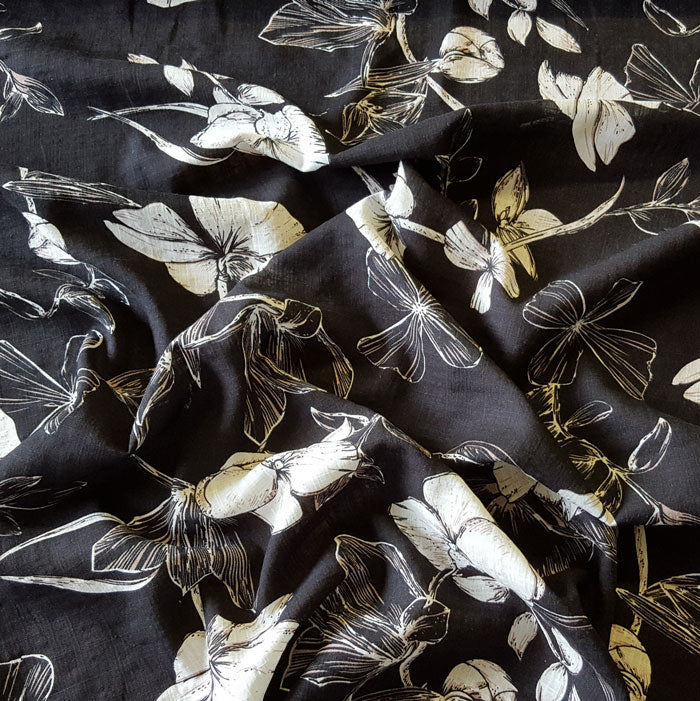 Viscose/Cotton Blend White Floral on Black Background - The Fabric Bee