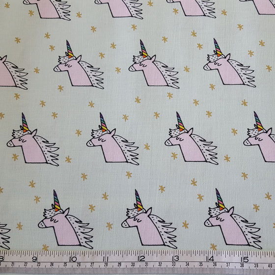 Medium Weight Cotton Fabric Pink Unicorns on Mint with Metallic Gold Stars - The Fabric Bee