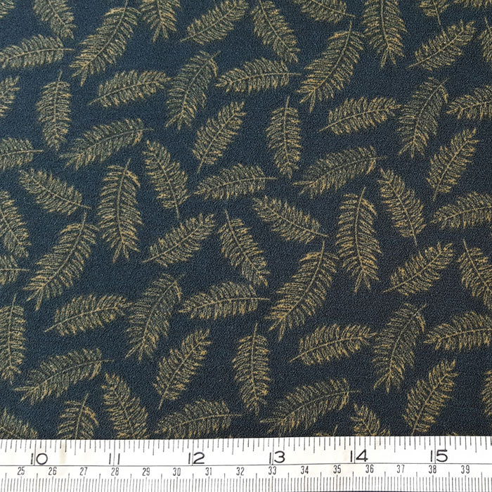 Polyester Crepe Fabric with stretch Beige Feathers on Green Background - The Fabric Bee