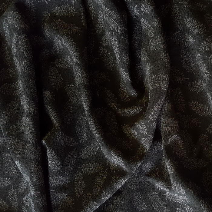 Polyester Crepe Fabric with stretch Grey Feathers on Black Background - The Fabric Bee
