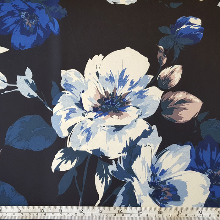 Polyester Fabric with Stretch Blue/White Floral on Black - The Fabric Bee