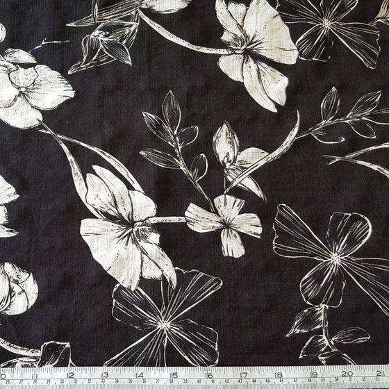 Viscose/Cotton Blend White Floral on Black Background - The Fabric Bee