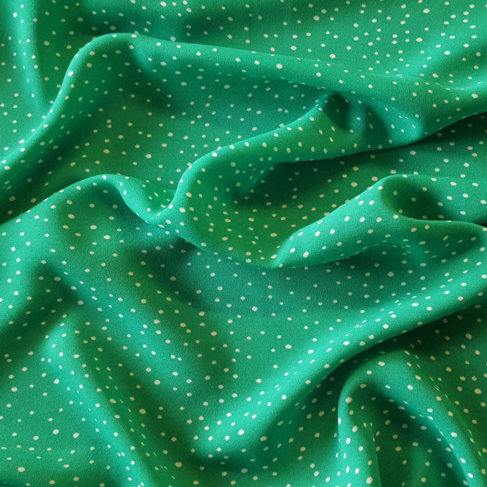 Polyester White Spots on Green Background - The Fabric Bee