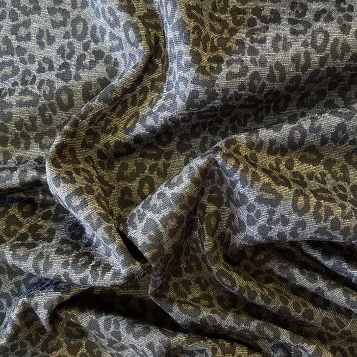 Jersey/Stretch Fabric Black Leopard Print on Grey Background - The Fabric Bee