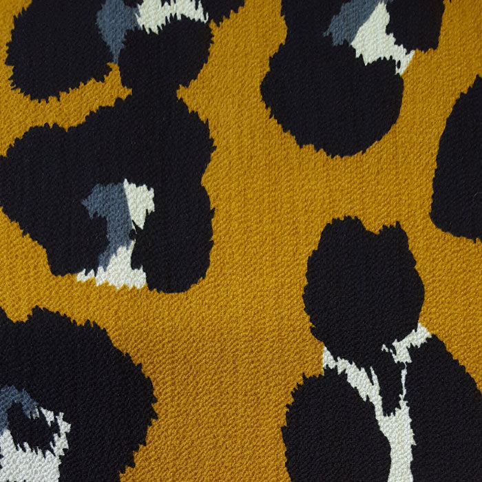 Polyester Animal Print on Mustard Background - The Fabric Bee