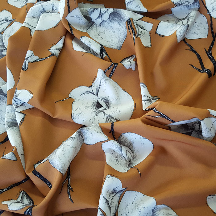Polyester with Stretch Ivory Flower on Tan - The Fabric Bee
