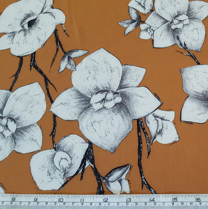Polyester with Stretch Ivory Flower on Tan - The Fabric Bee